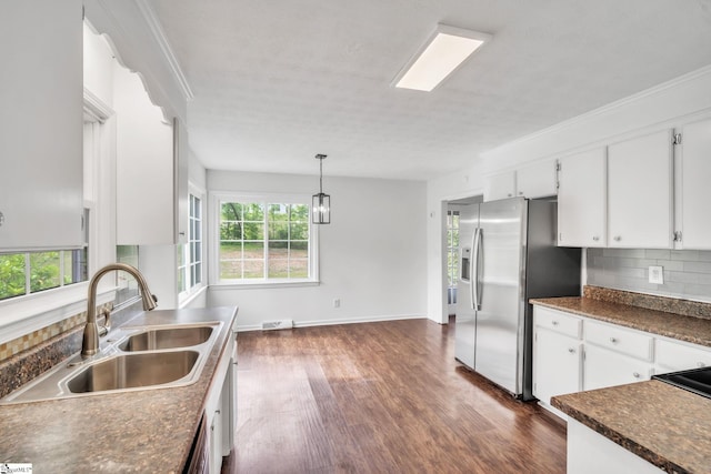 5 Huntley Castle Ct, Taylors, SC 29687 - kitchen featuring a sink, dark countertops, stainless steel refrigerator with ice dispenser, dark wood-type flooring, and decorative backsplash