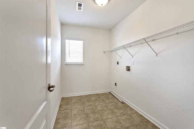 laundry room with baseboards, visible vents, washer hookup, laundry area, and electric dryer hookup