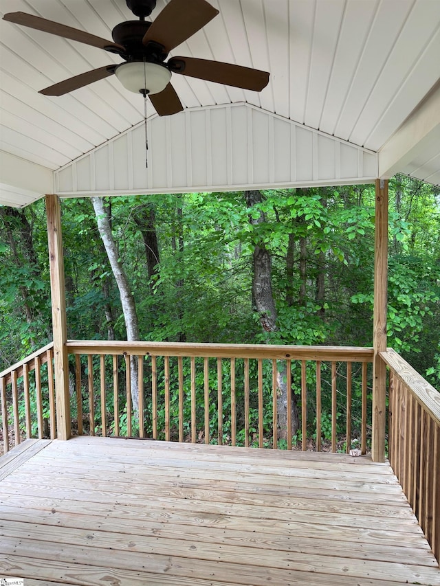 wooden deck with a ceiling fan