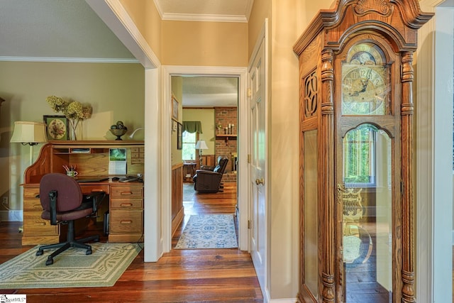 home office featuring crown molding and dark wood finished floors