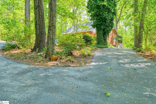 view of home's exterior featuring driveway