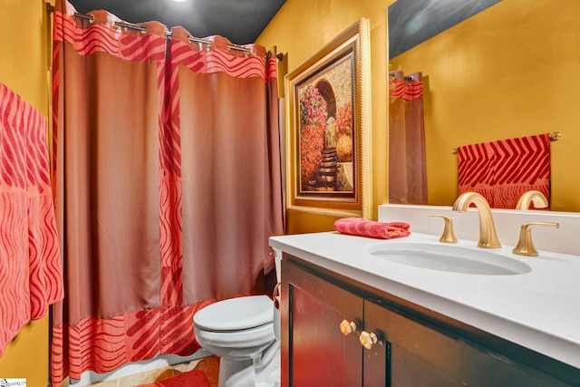 full bathroom with vanity, curtained shower, and toilet