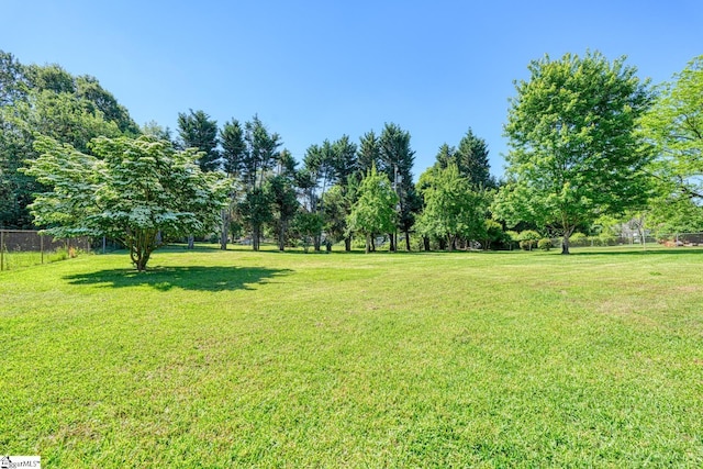 view of yard featuring fence