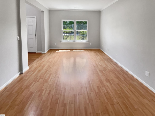 102 Thurber Way, Simpsonville, SC 29681 - empty room featuring baseboards, light wood finished floors, crown molding, and visible vents