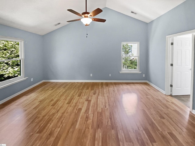 102 Thurber Way, Simpsonville, SC 29681 - spare room featuring light wood-type flooring, lofted ceiling, a ceiling fan, and visible vents