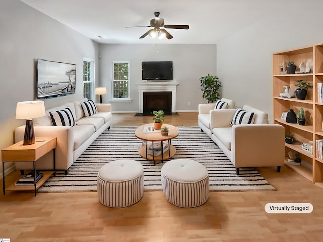 102 Thurber Way, Simpsonville, SC 29681 - living room with ceiling fan, a fireplace with flush hearth, and wood finished floors