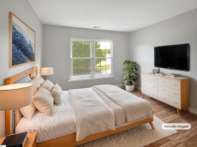 102 Thurber Way, Simpsonville, SC 29681 - bedroom with light wood-style flooring, baseboards, and visible vents