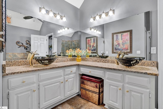 6 Shallow Creek Ct, Fountain Inn, SC 29644 - full bathroom featuring double vanity, a tile shower, and a sink