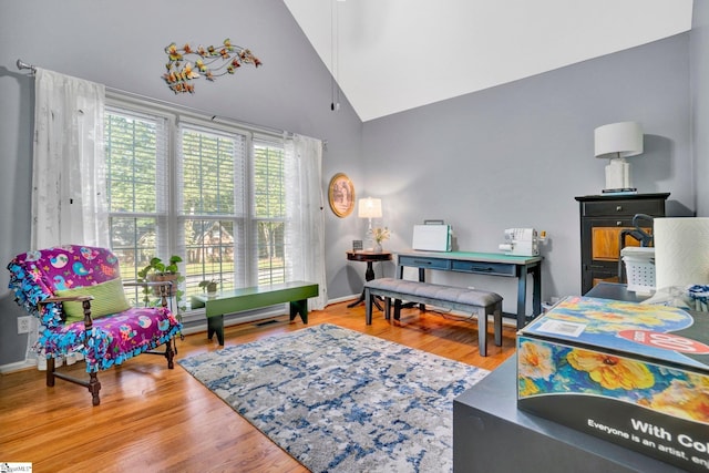 6 Shallow Creek Ct, Fountain Inn, SC 29644 - sitting room with baseboards, high vaulted ceiling, and wood finished floors