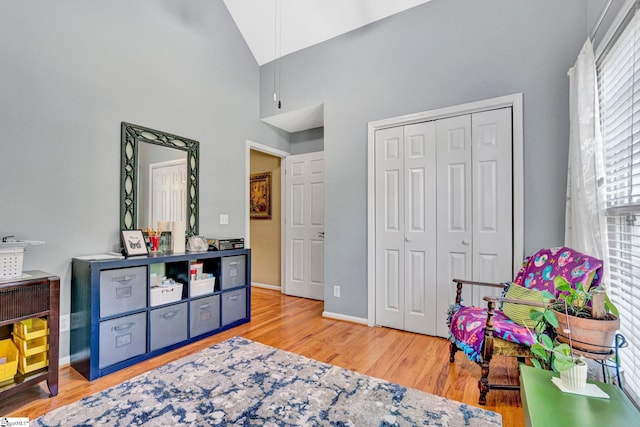 6 Shallow Creek Ct, Fountain Inn, SC 29644 - rec room featuring baseboards, wood finished floors, and a towering ceiling