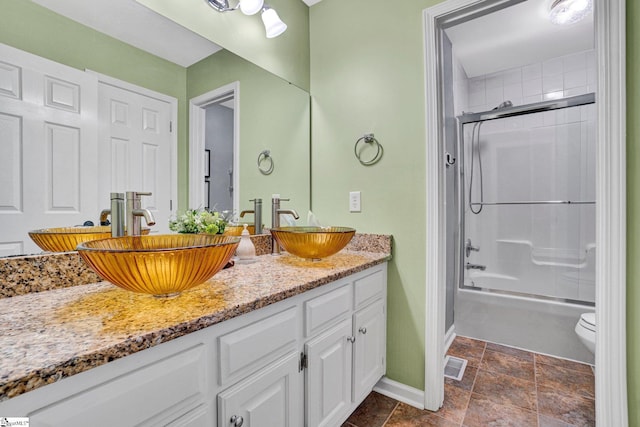 6 Shallow Creek Ct, Fountain Inn, SC 29644 - full bathroom with double vanity, visible vents, baseboards, and a sink