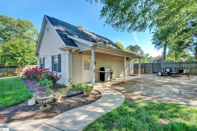 6 Shallow Creek Ct, Fountain Inn, SC 29644 - view of property exterior with a yard, a patio, roof with shingles, and a fenced backyard