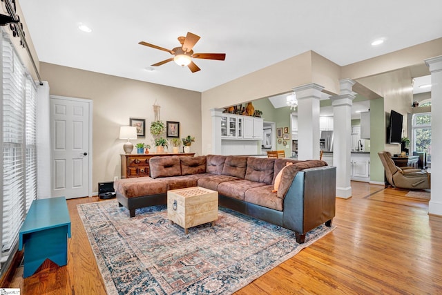 6 Shallow Creek Ct, Fountain Inn, SC 29644 - living area featuring recessed lighting, light wood finished floors, ceiling fan, and decorative columns