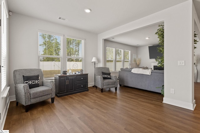 481 Fenwick Dr, Woodruff, SC 29388 - living area with visible vents, wood finished floors, and baseboards