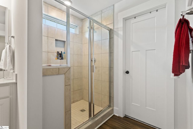 481 Fenwick Dr, Woodruff, SC 29388 - bathroom featuring vanity, a shower stall, and wood finished floors