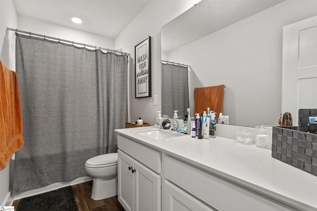 481 Fenwick Dr, Woodruff, SC 29388 - bathroom featuring toilet, wood finished floors, vanity, recessed lighting, and shower / bath combo
