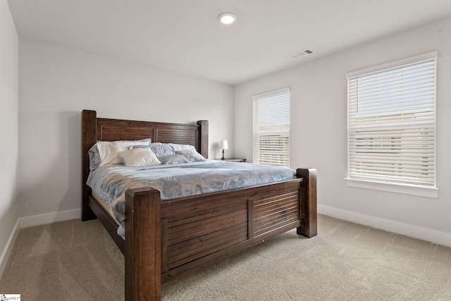 481 Fenwick Dr, Woodruff, SC 29388 - bedroom with light colored carpet, visible vents, and baseboards