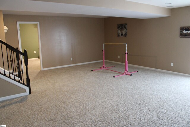 game room with carpet flooring and baseboards
