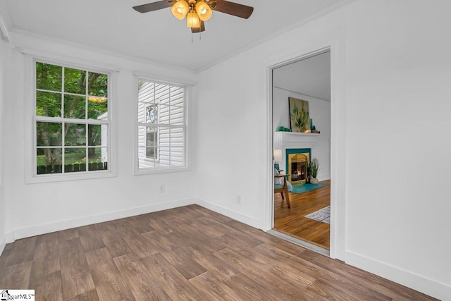 14 N Haven Dr, Greenville, SC 29617 - spare room featuring ceiling fan, dark wood finished floors, baseboards, and ornamental molding