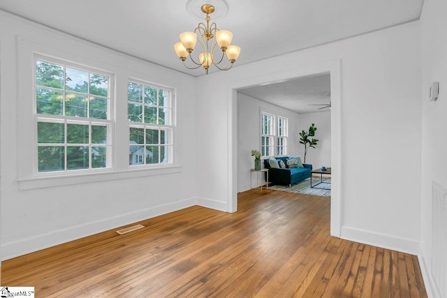 14 N Haven Dr, Greenville, SC 29617 - dining space featuring baseboards, a notable chandelier, visible vents, and wood-type flooring