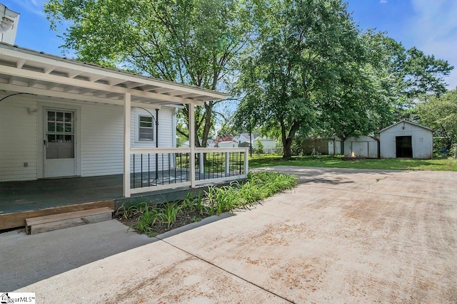 14 N Haven Dr, Greenville, SC 29617 - view of property exterior featuring a porch, a shed, and an outbuilding