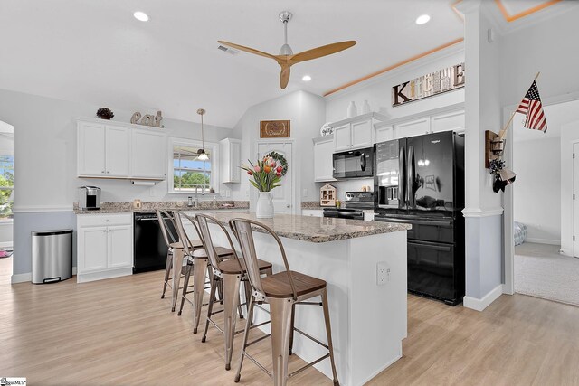 301 Highland Springs Loop, Inman, SC 29349 - kitchen featuring black appliances, ceiling fan, light wood finished floors, white cabinetry, and lofted ceiling