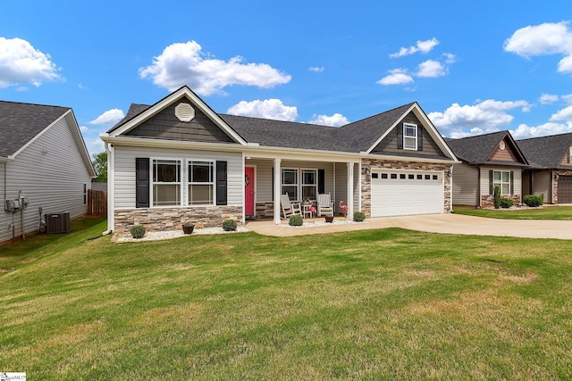 301 Highland Springs Loop, Inman, SC 29349 - craftsman house featuring stone siding, a porch, driveway, an attached garage, and a front lawn