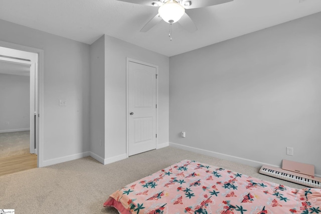 301 Highland Springs Loop, Inman, SC 29349 - bedroom featuring light carpet, baseboards, and a ceiling fan