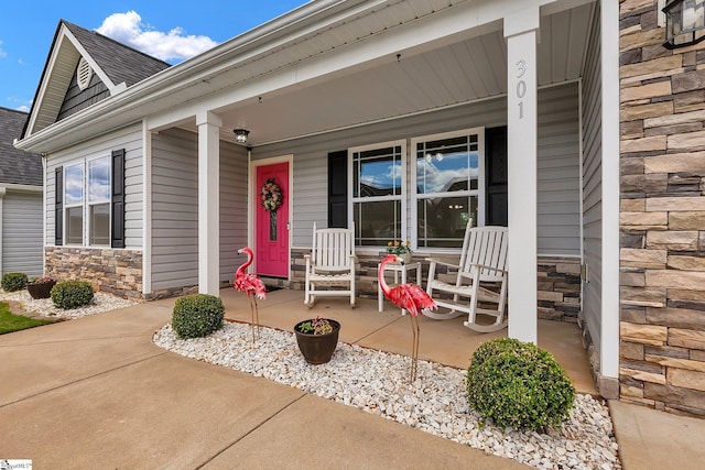301 Highland Springs Loop, Inman, SC 29349 - view of exterior entry featuring a porch and stone siding