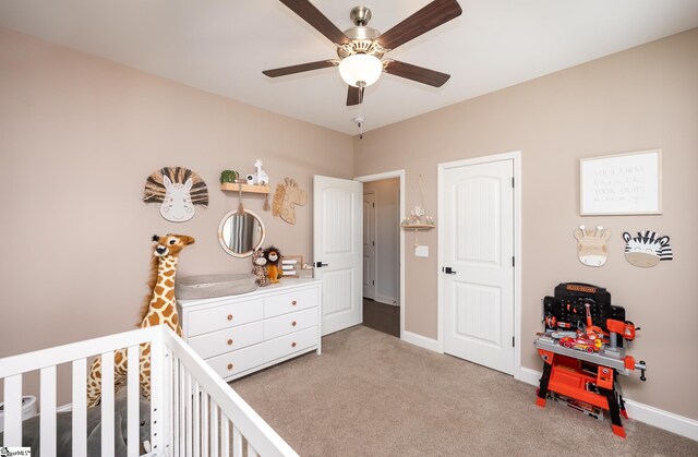 407 Saylor Way, Taylors, SC 29687 - bedroom with carpet floors, a crib, baseboards, and a ceiling fan