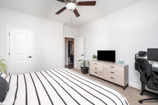 407 Saylor Way, Taylors, SC 29687 - bedroom with light colored carpet, an office area, a ceiling fan, and baseboards
