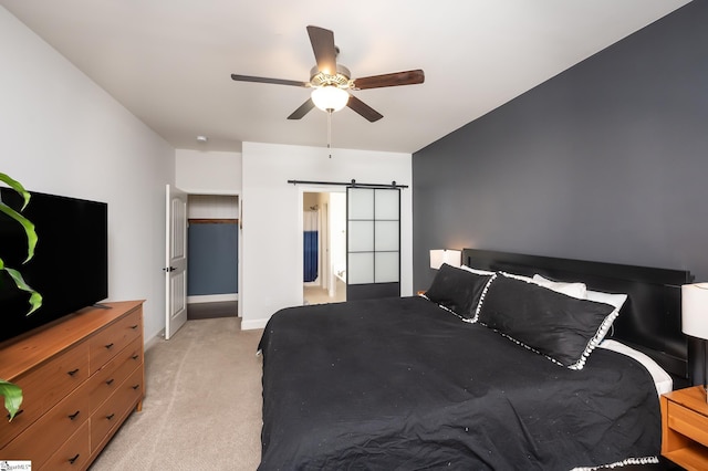 407 Saylor Way, Taylors, SC 29687 - bedroom featuring a barn door, light carpet, baseboards, and ceiling fan