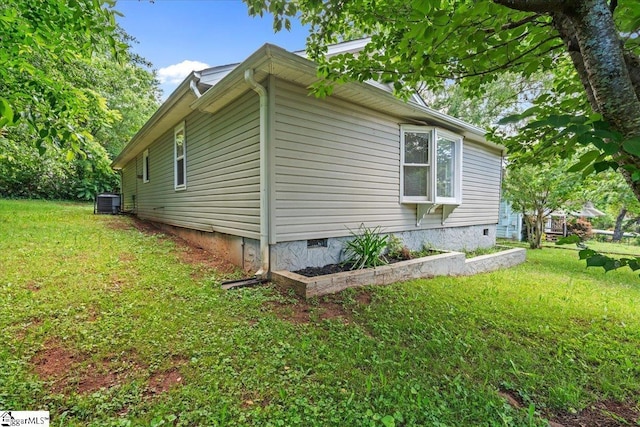 215 Rebecca St, Greenville, SC 29607 - view of property exterior with crawl space, a lawn, and central AC