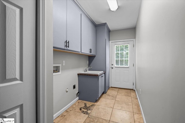 215 Rebecca St, Greenville, SC 29607 - washroom with cabinet space, washer hookup, hookup for an electric dryer, light tile patterned flooring, and baseboards