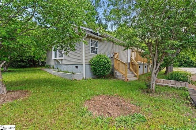 215 Rebecca St, Greenville, SC 29607 - view of property exterior with a yard