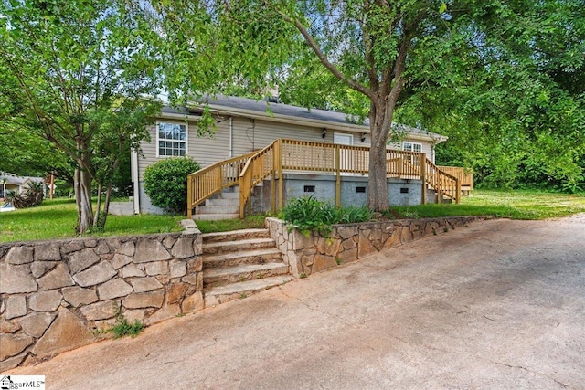 215 Rebecca St, Greenville, SC 29607 - view of front of home with stairs and a wooden deck