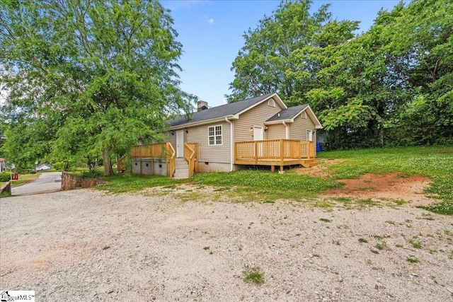 215 Rebecca St, Greenville, SC 29607 - rear view of property featuring crawl space, a wooden deck, and a chimney