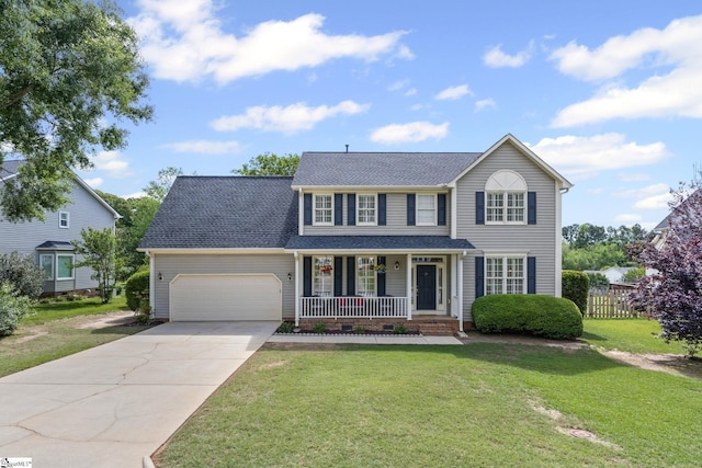 view of front facade featuring covered porch, an attached garage, driveway, and roof with shingles