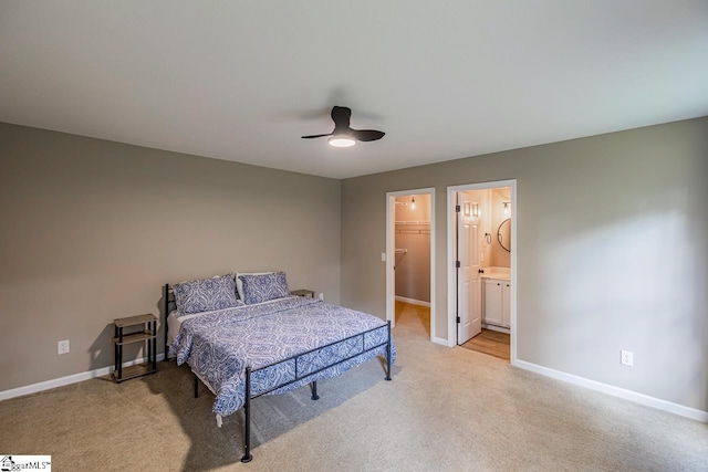 175 Falcon Ridge Dr, Boiling Springs, SC 29316 - bedroom with light colored carpet, baseboards, a spacious closet, and a ceiling fan