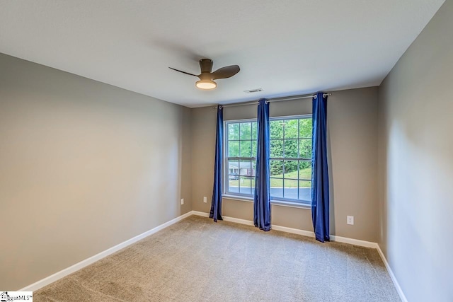 175 Falcon Ridge Dr, Boiling Springs, SC 29316 - spare room featuring light colored carpet, baseboards, and ceiling fan