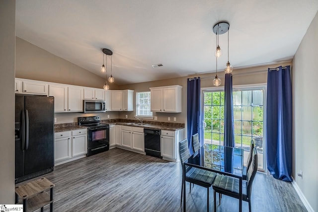 175 Falcon Ridge Dr, Boiling Springs, SC 29316 - kitchen featuring black appliances, a sink, dark countertops, dark wood-style flooring, and white cabinets