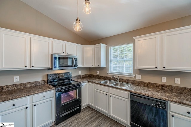 175 Falcon Ridge Dr, Boiling Springs, SC 29316 - kitchen with black appliances, a sink, dark countertops, lofted ceiling, and white cabinetry