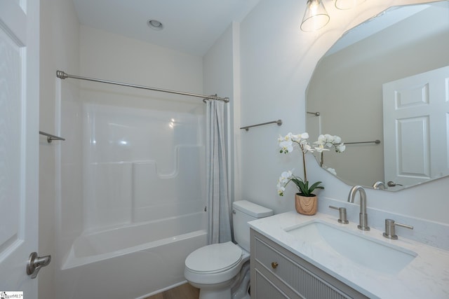 full bathroom with toilet, vanity, and shower / tub combo with curtain