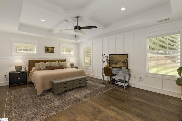 bedroom featuring a decorative wall, dark wood finished floors, coffered ceiling, recessed lighting, and ceiling fan