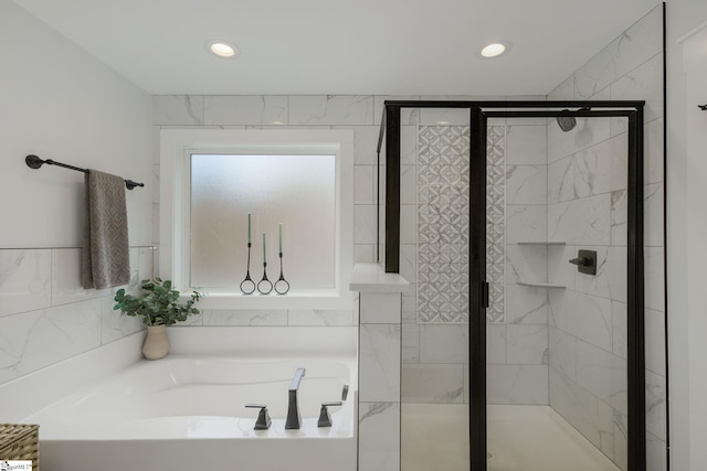 full bath with a shower stall, a garden tub, and recessed lighting