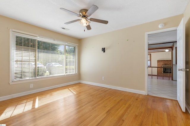 2028 Haven Ct, Boiling Springs, SC 29316 - spare room with a ceiling fan, light wood finished floors, a smoke detector, and baseboards