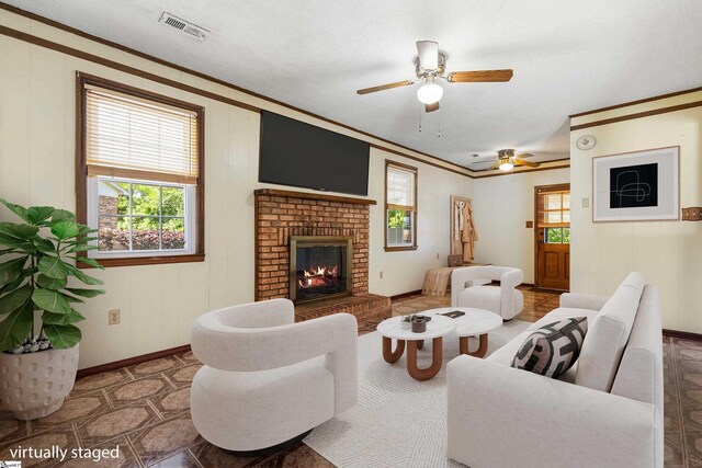 2028 Haven Ct, Boiling Springs, SC 29316 - living area with ornamental molding, ceiling fan, a fireplace, and baseboards