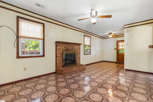 2028 Haven Ct, Boiling Springs, SC 29316 - unfurnished living room with ceiling fan, crown molding, a brick fireplace, and baseboards