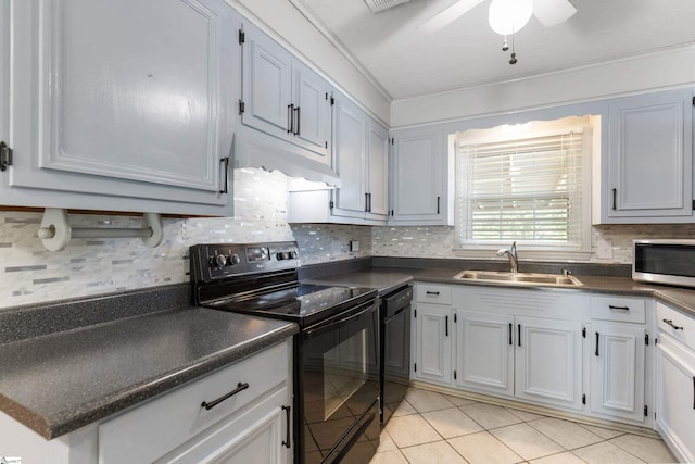 2028 Haven Ct, Boiling Springs, SC 29316 - kitchen featuring black range with electric stovetop, a sink, under cabinet range hood, stainless steel microwave, and dark countertops