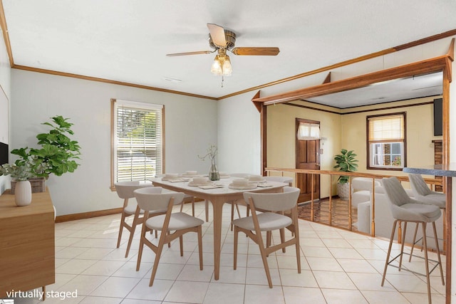 2028 Haven Ct, Boiling Springs, SC 29316 - dining space featuring ornamental molding, plenty of natural light, ceiling fan, light tile patterned floors, and baseboards